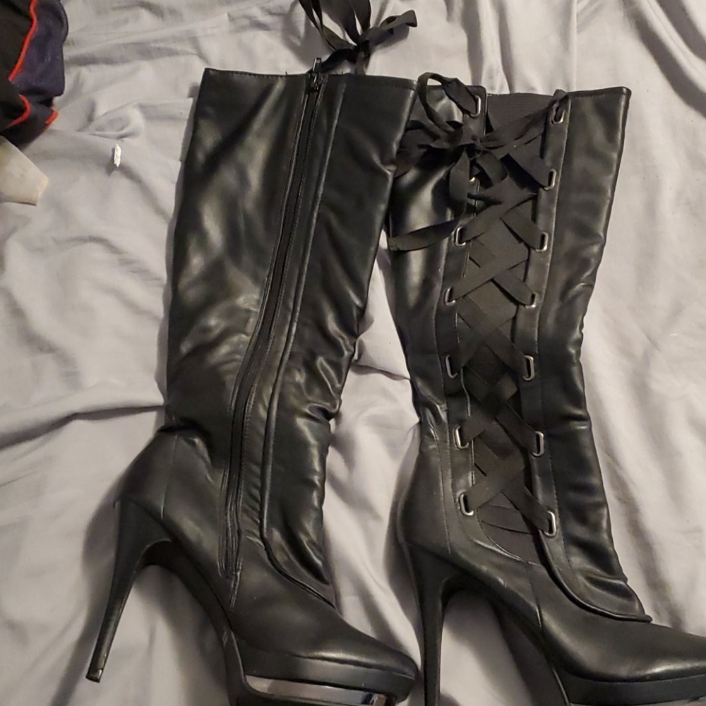 High heeled knee high boots